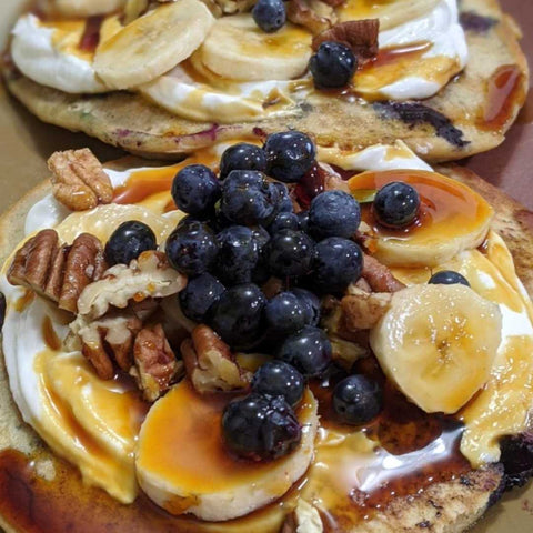 Sourdough Pancakes topped with Blueberries, Bananas and Birch Syrup 