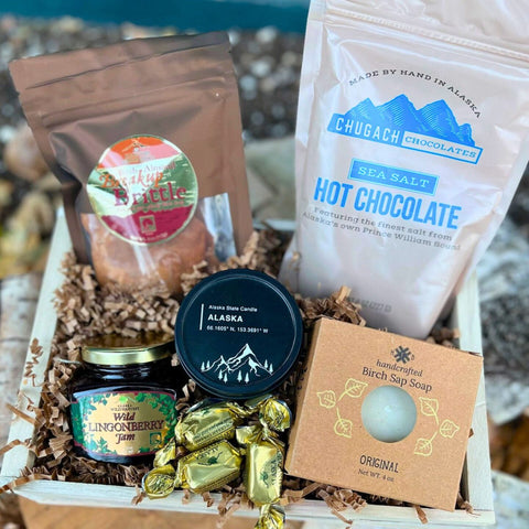 The Aurora Crate Gift basket with Chugach Hot Chocolate, Wild Lingonberry jam, birch sap soap, birch almond brittle, and other items.