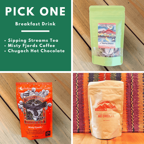 Three packages of different breakfast drinks: tea, coffee, and hot chocolate on a wooden surface with text 'Pick One' and drink options.